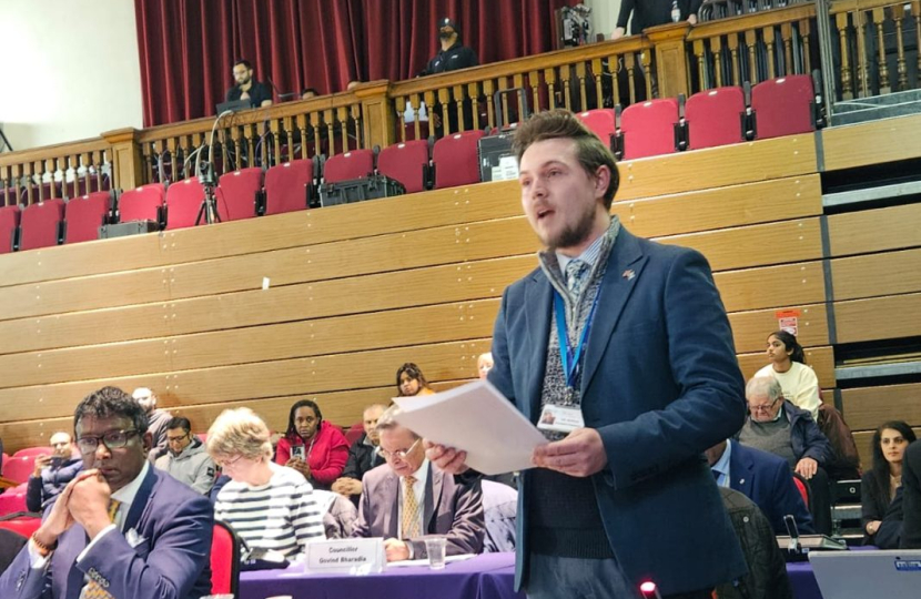 Cllr. Matthew speaking at the Council meeting