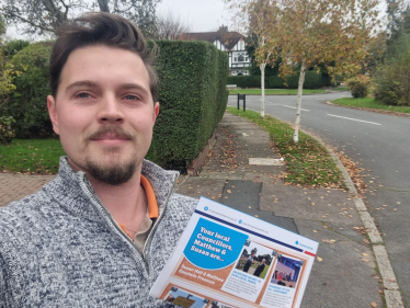 Matthew delivering leaflets